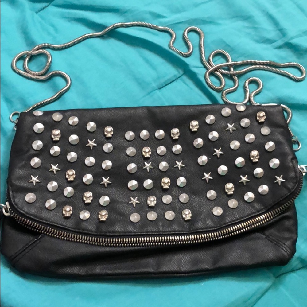 Skull studded faux leather crossbody bag